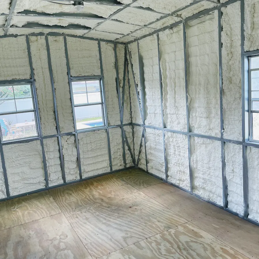 Closed-cell spray foam insulation applied to wall cavities in a residential project in Luzerne