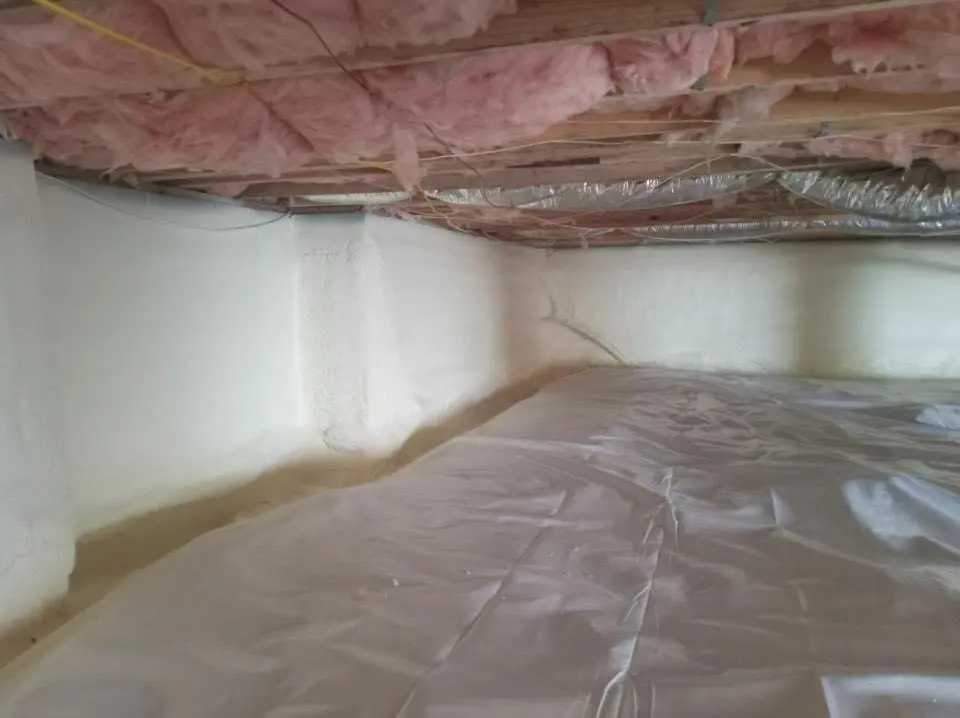 Crawl space encapsulation with closed-cell spray foam for Commercial Roof Restoration in Luzerne